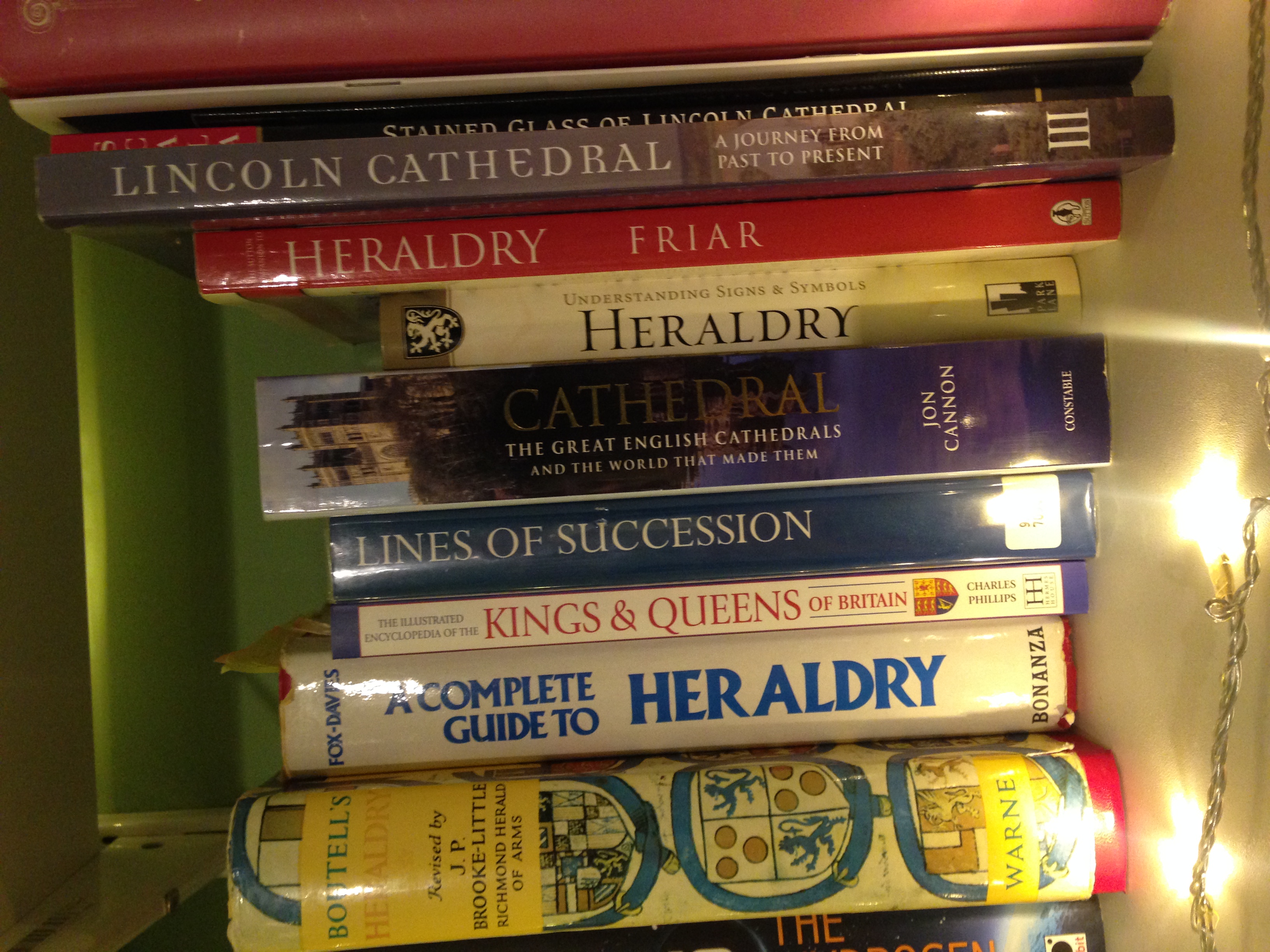 My heraldry collection, so far. (I have many more books as PDFs from archive.org but these don't make for a good picture...)